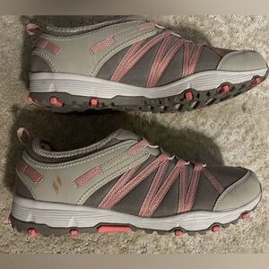 Sketchers slip on / no tie memory foam tennis shoes. Womens 11.